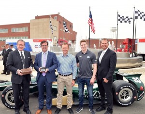 Allison Transmission and the Indianapolis Motor Speedway celebrated their shared heritage and recent centennial milestones with a ceremony to honor the 100th running of the Indianapolis 500. From left: Larry Dewey, chairman and CEO of Allison Transmission; Doug Boles, president of the Indianapolis Motor Speedway; Ed Carpenter, owner and driver with Ed Carpenter Racing; Josef Newgarden, driver with Ed Carpenter Racing; Lou Gilbert, director of North American marketing and global brand development for Allison Transmission.