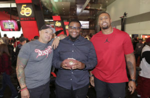 The NFL Network debuted new reality series “Tackle My Ride,” starring Super Bowl Champion LaMarr Woodley, right, and Demented Customs master car builder, James Torrez, left, with featured Cleveland fan, Joe Whitthorne, Nov. 2 at 2016 SEMA Show in Las Vegas.